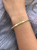 “LOVE” BANGLE 14K GOLD PLATED OVER STERLING SILVER